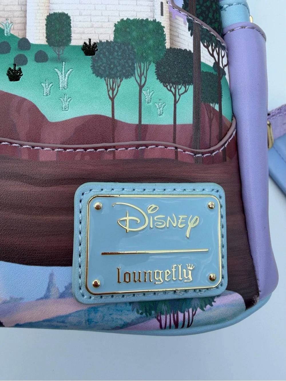 Loungefly Lavender and Sky Blue Rapunzel Castle Mini Backpack